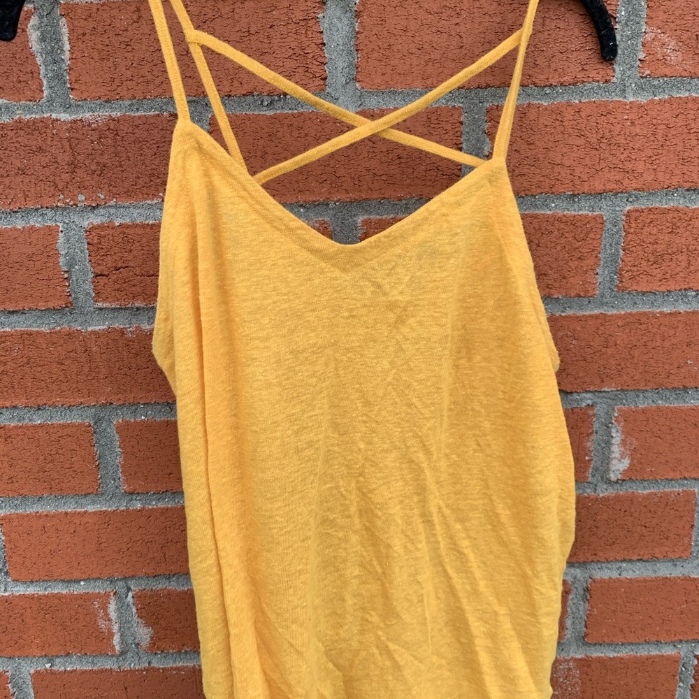 Flowy yellow tank top with cross back design